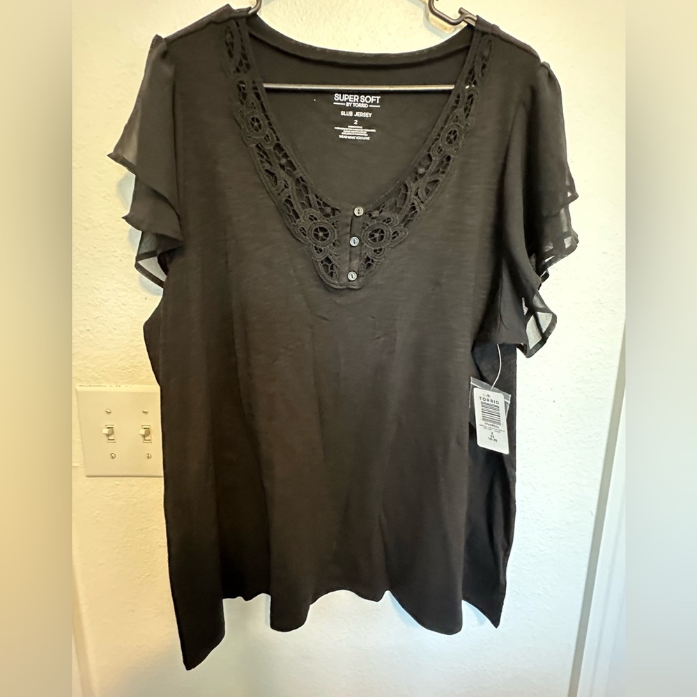 NWT- flutter sleeve, black t shirt from Torrid. Size 2x